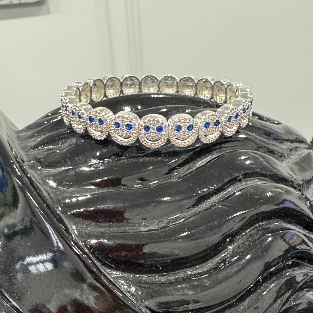 Lisa Gozlan Silver Smile Face Bracelet with Blue Accents